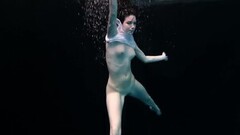 Sexy chicks swim nude underwater Thumb