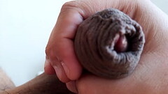 Slowly stroking my uncut cock, closeup. May 24, 2024. Thumb