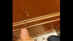 Blond teen jerks off and cums in public restroom Thumb