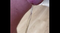 Semi hard cock having a piss Thumb