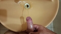 Hard cock pissing Thumb