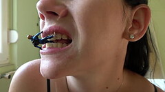 Beautiful giantess Anna plays with a tiny man Thumb