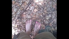 Barefeet walking in the forrest Thumb