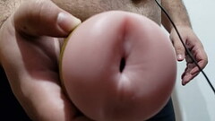 Playing with my Fleshlights Thumb