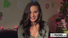 Lily tells us her horny Christmas wishes before satisfying herself in both holes Thumb
