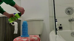 Riding a XXXL dildo Thumb