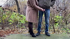 StepMother-in-law in leather skirt and heels holds son-in-law'_s dick while he pees Thumb