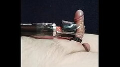 Cock tied to a Hitachi Vibro Thumb